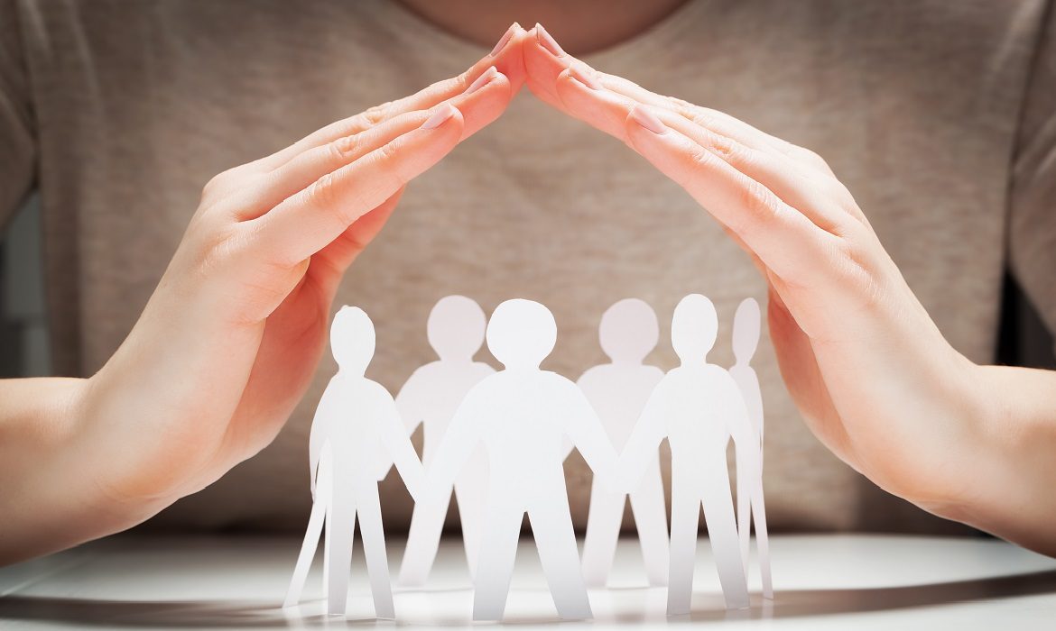 Paper,People,Under,Hands,In,Gesture,Of,Protection.,Concept,Of