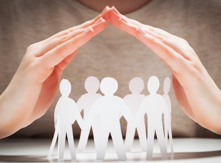 Paper,People,Under,Hands,In,Gesture,Of,Protection.,Concept,Of